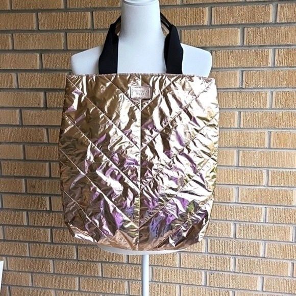 Victoria's Secret Handbags - Victoria Secret a light rosegold tone quilted metallic long tote